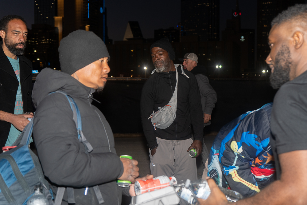 Volunteers handing out groceries and meals